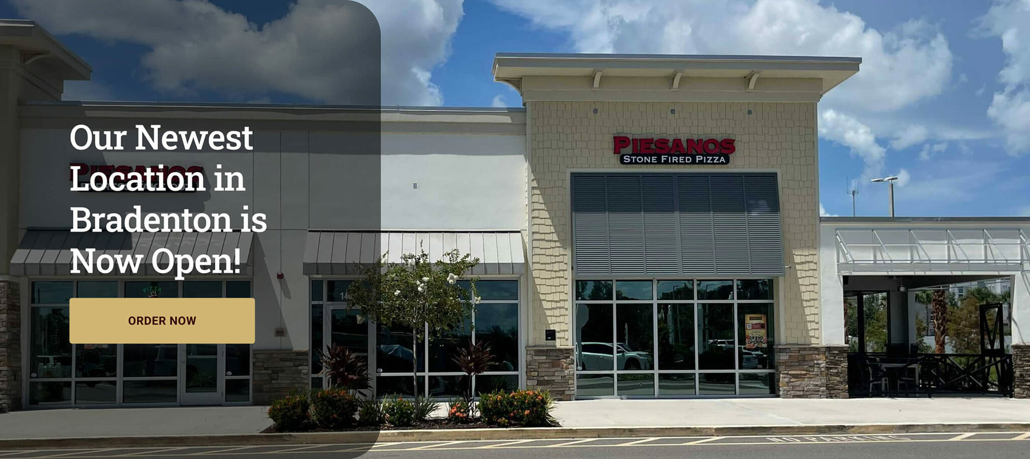 Exterior photo of Piesanos restaurant with text overlaid the image stating, our newest location in Bradenton is now open!
